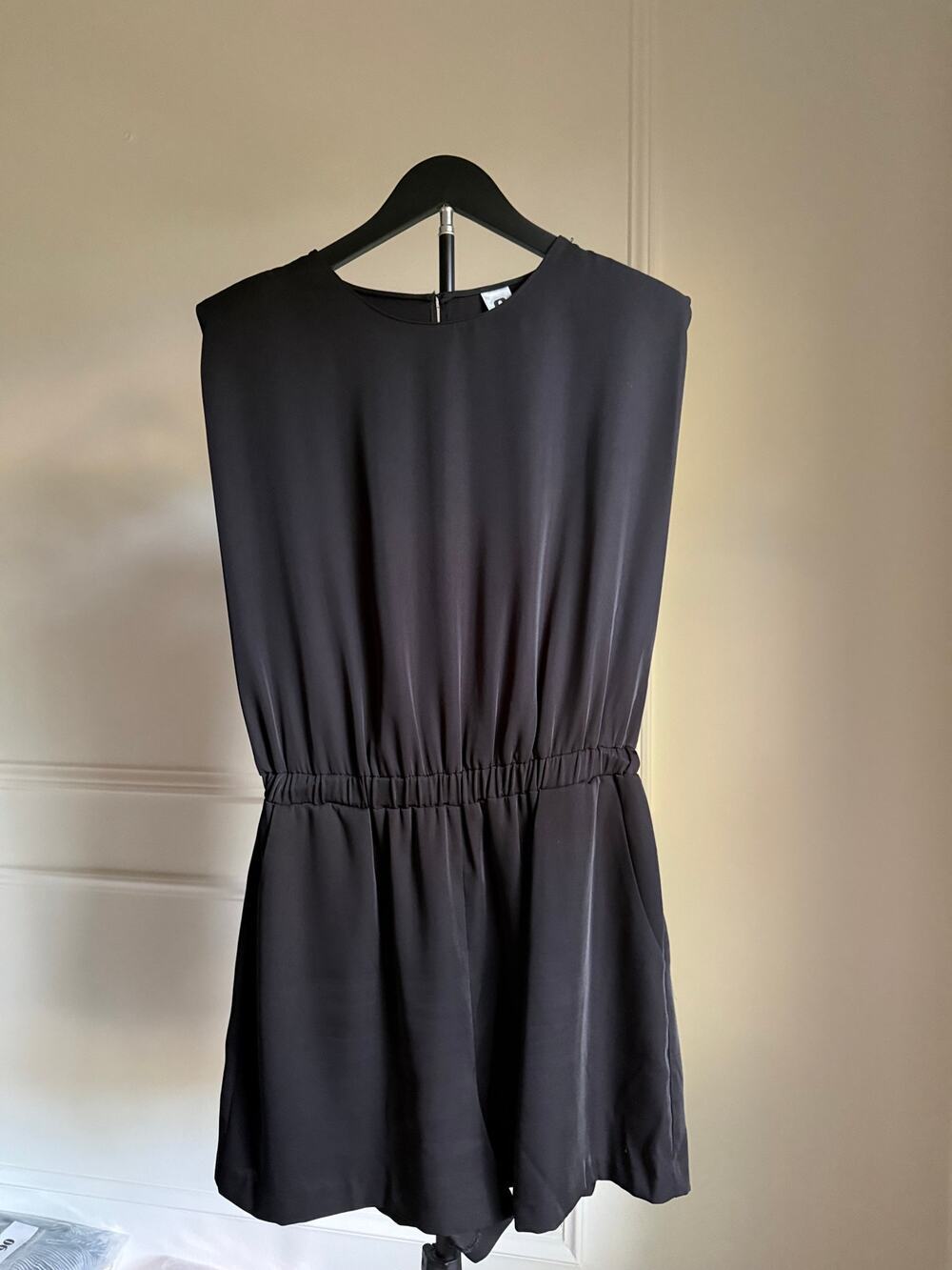 A New York Black Sleeveless Romper Women’s L Elastic Waist Shoulder Pads